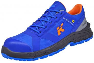 The shoe is lightweight and sporty, predominantly black with blue accents. It has a round toe, padded sole, and colored laces. Ideal for activities and comfortable.