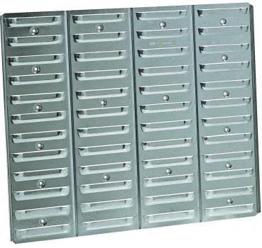 The image shows a metal board with several equal-sized, rectangular compartments. Each compartment has a small opening or handle to allow access, arranged in multiple horizontal rows.