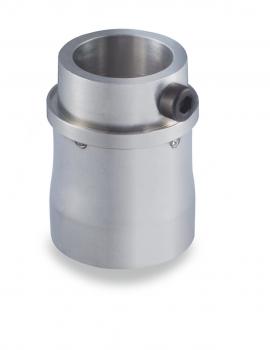 The image shows a cylindrical stainless steel piece. It has a smooth surface, is open at the top, and has a side opening as well as an attached screw.
