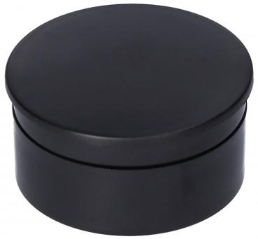 It is a round, black box with a flat lid. The surface is smooth and shiny, and the box has a simple, elegant shape.