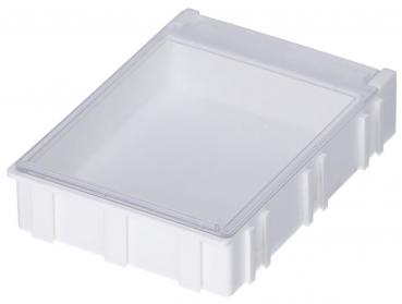 Das Bild zeigt eine flache, rechteckige und transparente Kunststoffbox mit einem geschlossenen Deckel. Die Wände sind strukturiert, und die Box hat eine praktische Form für Aufbewahrung.