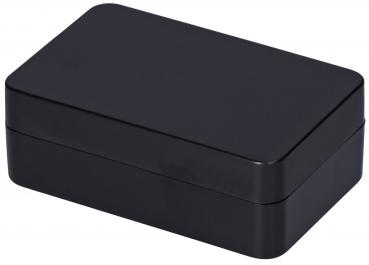 The image shows a rectangular, matte black box with rounded edges. It has a smooth, uniform surface finish and appears simple and modern.