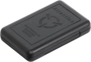 The image displays a black, rectangular device with a smooth surface. On the front, the words "Attention" and "Electrostatic Sensitive Devices" are embossed to indicate sensitivity.