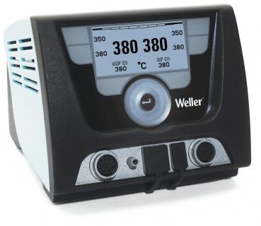 The image displays a soldering iron vacuum with a black and silver casing. In the center, there is a large digital display featuring temperature readings and control knobs.