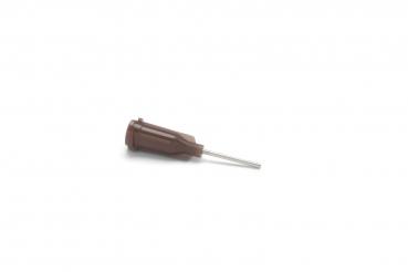 The image shows a brown object with a narrow, silver end. The upper part has a grippy shape, while the end tapers to a point and rests on a hard surface.