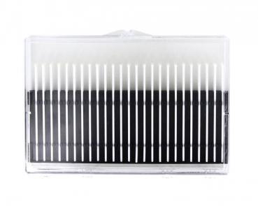 The image shows a rectangular, clear container with several parallel, fine, white and black stripes. It appears structured and could be intended for cosmetic applications.