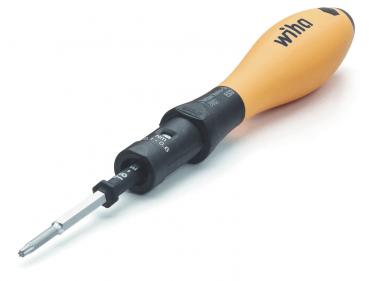Das Bild zeigt einen Schraubendreher mit einem orangefarbenen, ergonomischen Griff und einem schwarzen Schaft. An der Spitze ist eine wechselbare Klinge, die flach und schmal ist.