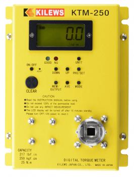 The image shows a yellow digital torque meter. It has a display with readings for values and units. On the front, there are buttons and a set of connectors.