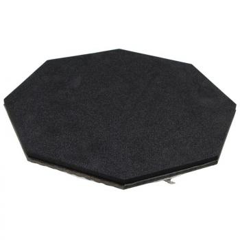 The image shows a flat, hexagonal plate in black. The surface is smooth, and the edges are even and clearly defined. The plate appears stable and solid.