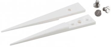 The image shows two white, pointed plastic parts shaped like wedges. Next to them are two silver screws. Each part has a hole in the center.
