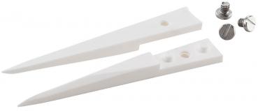 The image shows two elongated, pointed objects made of white material, shaped like wedges. Next to them are two screws, one with a Phillips head and one with a crowned head.