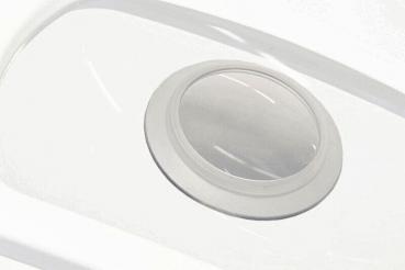 The image shows a round, smooth lens in a white casing. The lens has a thin edge and is slightly elevated, surrounded by a smooth surface.
