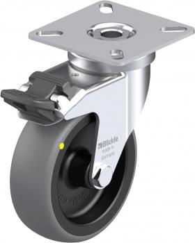 The image shows a caster wheel with a metallic holder and a gray rubber tread. It has a solid handle and a yellow dot on the side for identification.