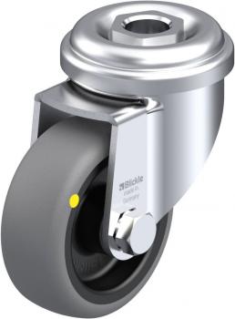 The image shows a silver roller bearing with a large gray rubber roller. The top surface is round and has a central screw. A small yellow marking is visible.