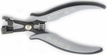 The image shows a pair of pliers with gray, rubberized handles and a black metal tip. It features a spring-loaded opening and is designed for precise gripping or cutting.