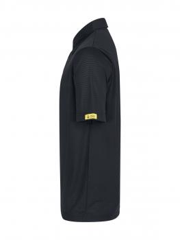 The image shows a black polo shirt with short sleeves, a collar, and a yellow label on one sleeve. It is in a slim fit and solid color.