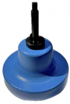 The image shows a blue spinner that stands on a wide, round base. In the center, there is a black, raised handle or pin used for spinning.