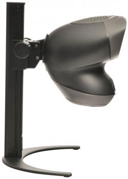 The image shows a black, futuristic-shaped speaker on a sturdy, metallic stand. The speaker has a round, curved shape and is wider at the front.