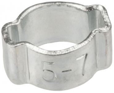 Das Bild zeigt eine silberne, metallene Schelle in U-Form, mit einer markierten Zahl "5-7" auf der Außenseite. Sie hat eine glatte Oberfläche und ist innen hohl.