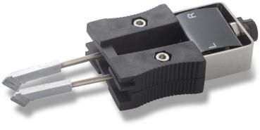 The image displays a technical connector with two metallic contacts. It features a black plastic handle and a control lever marked with the letters "L" and "R".