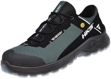 The shoe is lightweight and breathable, with a gray upper and pink accents. The sole is grippy and thick, ideal for outdoor activities. Laces ensure a secure fit.