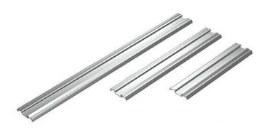 In the picture, there are three parallel-arranged, matte aluminum profiles of various lengths. They have a rectangular shape with a slightly curved top.
