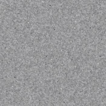 The image displays a uniform, structured surface in various shades of gray. The surface has a fine texture with irregular, small particles that create a lively yet subtle appearance.