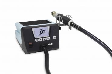 The image shows a Weller heating station with a digital display, to which a hot air nozzle attachment is connected. The station has a black body and a blue top.