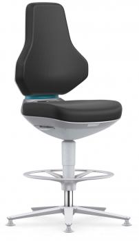The image shows a modern, ergonomic office chair with black upholstery and a high, curved backrest. The chair has a silver base with a round plastic foundation.