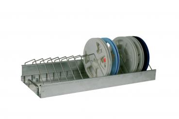 The image shows a metal dish rack with multiple compartments. It contains round, flat plates in various colors, which are arranged at an angle.