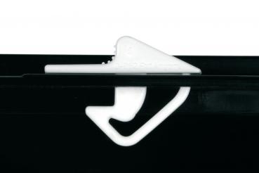 The image shows a white plastic cap positioned on a black part. The cap has a curved shape with a hook and a flat, pointed side.