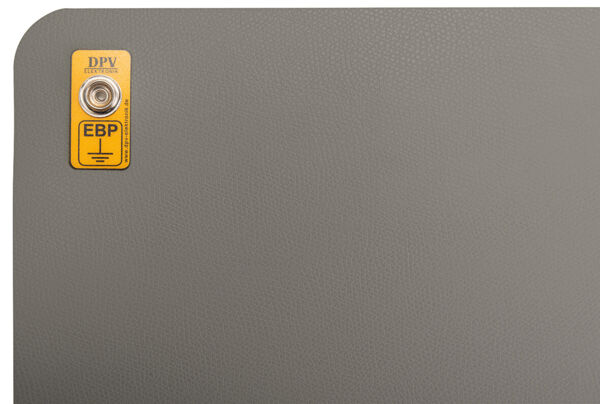 The image shows a gray surface with a rounded corner. In the top left, there is a yellow label with the text "DPV EBP" and a mounting point.