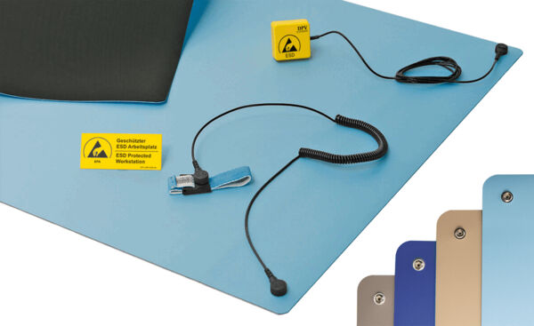 The image displays a blue ESD protection mat with a yellow warning sign. A cable with a grounding clip and a clamp is connected. Color variants of the mat are also visible.