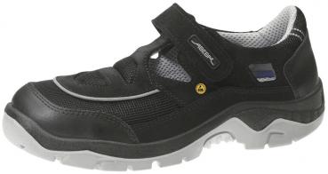 The shoe is black with gray accents. It features a Velcro fastener and a non-slip sole, ideal for comfort and stability. The upper is made of lightweight, durable fabric.