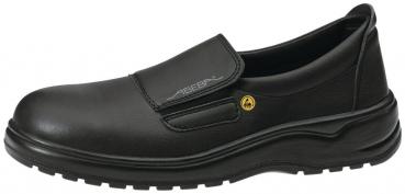 The image shows a black, comfortable men's shoe without laces. It has a flat sole, a wide toe cap, and a Velcro fastener on the instep. The surface is made of smooth leather.