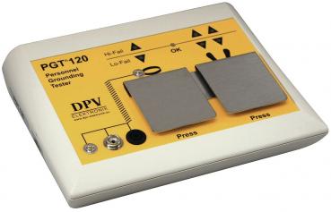 The image shows a white tester with a yellow top. There are various symbols and buttons on the surface. Two metal plates are designed to be pressed to conduct a test.