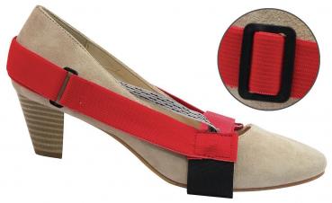 The image shows a beige high heel with a red elastic band stretched over the forefoot. A black holder is visible under the shoe. A smaller section shows the elastic band in closer detail.