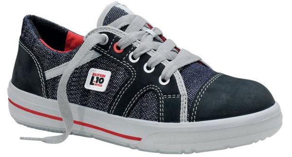 The shoe is a casual sneaker featuring a combination of dark blue fabric and gray leather. It has a white rubber sole and red accents. The laces are gray.