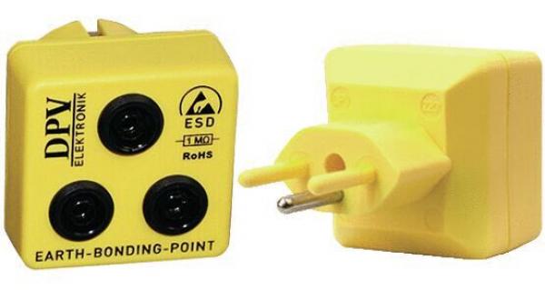 The image shows a yellow grounding adapter with three round sockets on one side and a typical European plug on the other side.