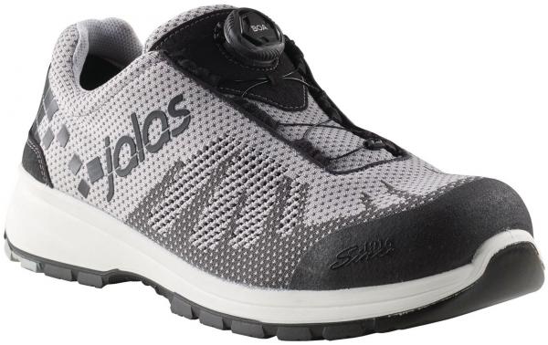 Der Schuh ist leicht und sportlich, mit einem grauen, luftigen Obermaterial und schwarzen Akzenten. Er hat eine rutschfeste, weiße Sohle und einen speziellen Verschlussmechanismus an der Oberseite.