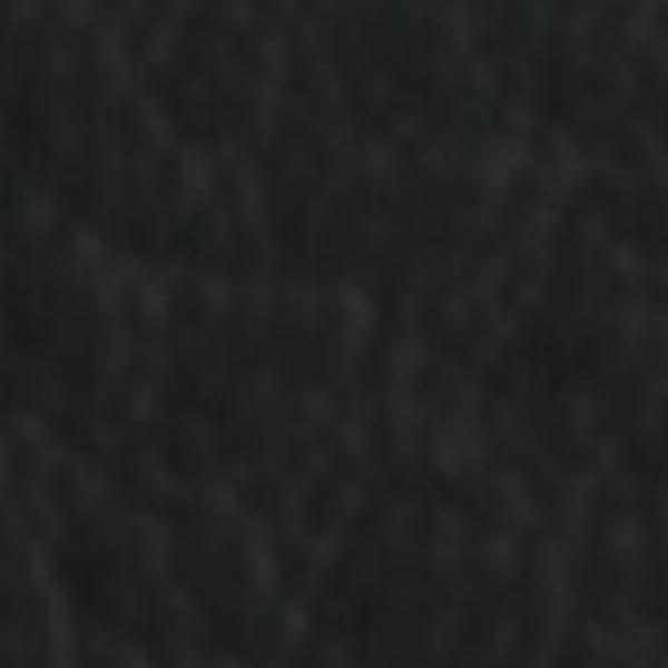 The image displays a matte, textured surface in dark black. The surface features slight variations that provide a subtle depth. It appears homogeneous and even.