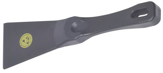The image shows a narrow spatula with a flat, broad end and a long, ergonomic handle. The handle has a hole for hanging. The color is predominantly dark gray.