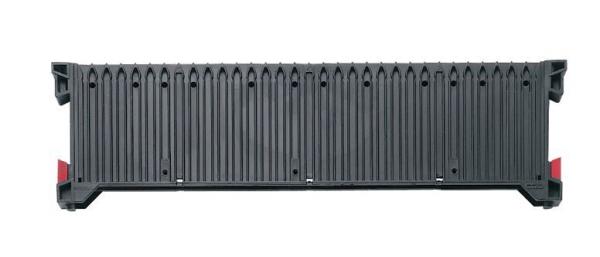 The image shows a long, rectangular, black container. The surface is ribbed and has red reflectors at the ends. The container is sturdy and has an industrial aesthetic.
