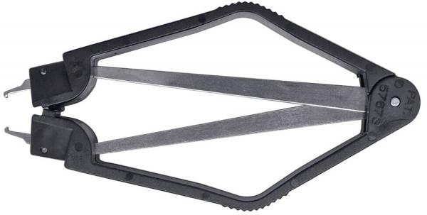 Das Bild zeigt einen schwarzen Zirkel aus Kunststoff und Metall. Er hat zwei dünne, bewegliche Arme mit spitzen Enden, die sich an einem Scharnier in der Mitte öffnen und schließen lassen.