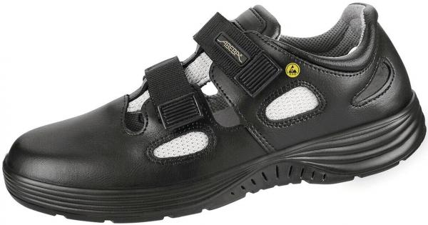The shoe is black with a sporty design. It has two Velcro straps and breathable mesh inserts. The sole is sturdy and provides good grip. Ideal for active use.