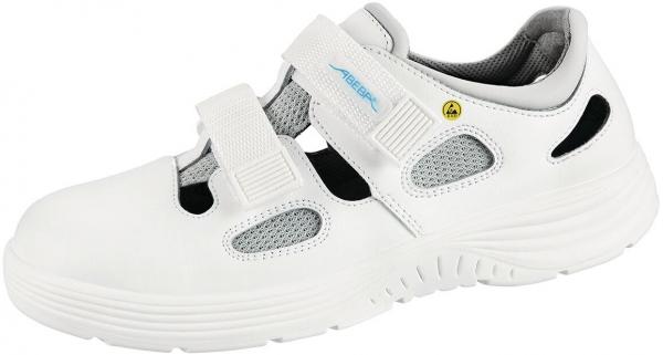 The shoe is white with gray and black details. It has a curved, non-slip sole, two Velcro straps, and breathable inserts. Ideal for comfort and support.