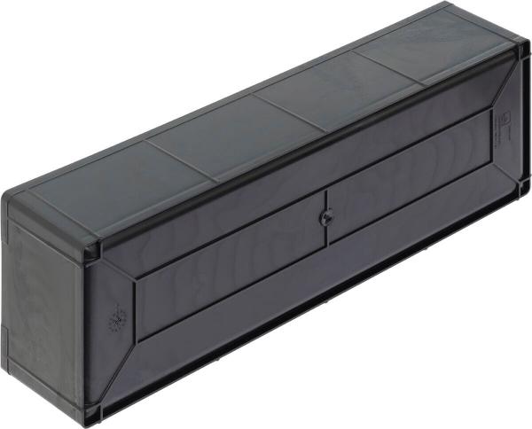 Das Bild zeigt eine rechteckige, durchsichtige schwarze Box mit einem abgerundeten Deckel. Sie hat eine glatte Oberfläche und Öffnungen auf der Oberseite, um den Inhalt zu entnehmen.