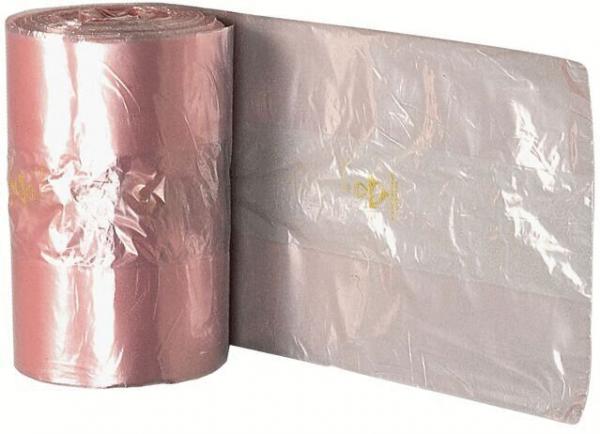 The image shows a roll of pink plastic wrap lying on the left side, and next to it a spread-out transparent film. Both are shiny and smooth.
