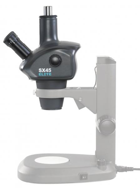 The image shows a microscope. It has a black body with two eyepieces and is mounted on a stable base. The structure is modern and functional, with controls for adjustment.