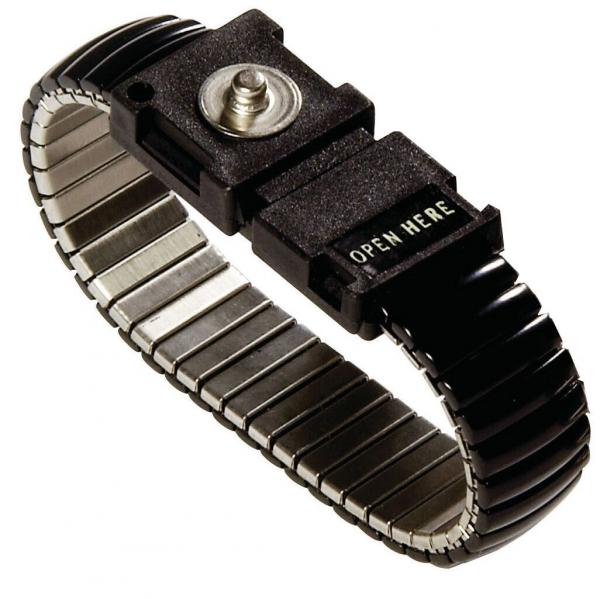 The image shows a metal bracelet with a flexible link structure. It has a black clasp marked "OPEN HERE" that is easy to open.